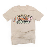 Don't Judge Me By My Book Covers - Unisex Tee