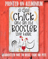 A Cute Chick and an Old Rooster Live Here - Metal Sign