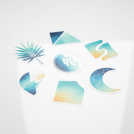 Clear transparent die-cut stickers in various custom shapes showing see-through vinyl effect