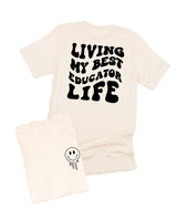 Living My Best Educator Life - Melty Smiley (pf & b) - Unisex Tee
