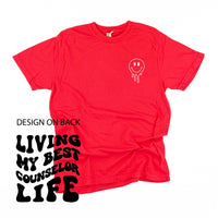 Living My Best Counselor Life - Melty Smiley (pf & b) - Comfort Colors Tee