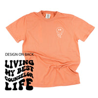 Living My Best Counselor Life - Melty Smiley (pf & b) - Comfort Colors Tee