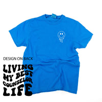 Living My Best Counselor Life - Melty Smiley (pf & b) - Comfort Colors Tee