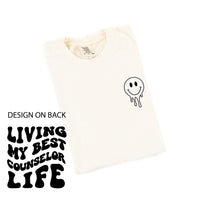 Living My Best Counselor Life - Melty Smiley (pf & b) - Comfort Colors Tee