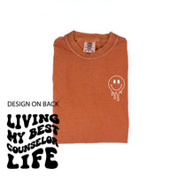 Living My Best Counselor Life - Melty Smiley (pf & b) - Comfort Colors Tee