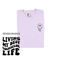 Living My Best Counselor Life - Melty Smiley (pf & b) - Comfort Colors Tee