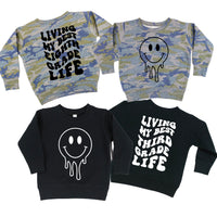 Living My Best (Choose Your Grade) Life - Melty Smiley (f & b) - Child Sweater