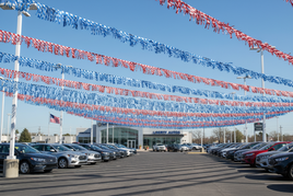 Patriotic Fringe Streamers at a Car Dealership