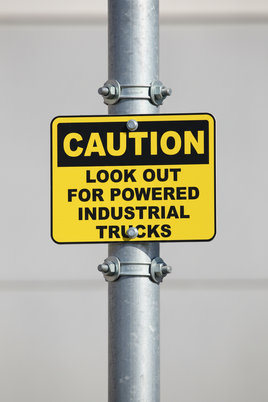 Caution Look Out For Trucks Sign
