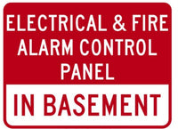 Red and white sign with text about electrical and fire alarm control panel in basement