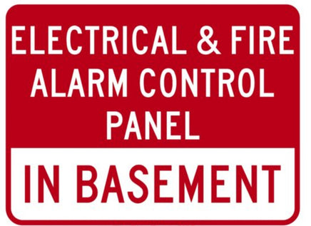 Red and white sign with text about electrical and fire alarm control panel in basement