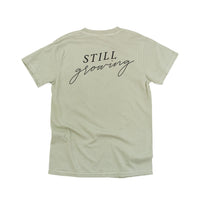 Embroidered Pocket Flowers on Front w/ Printed Still Growing on Back - Comfort Colors Tee